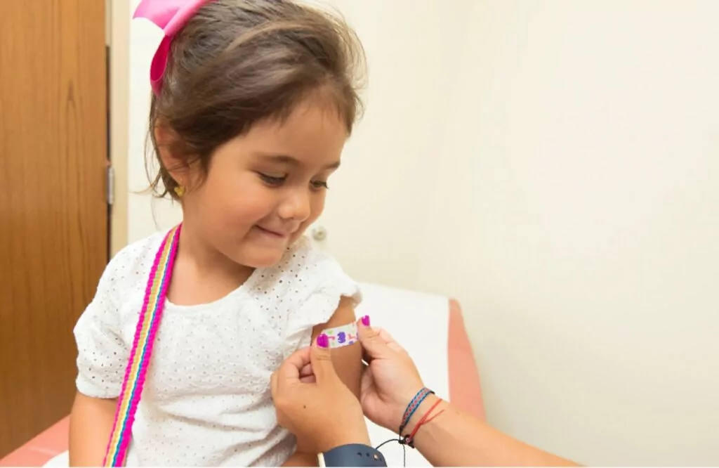 A child receives a treatment shot